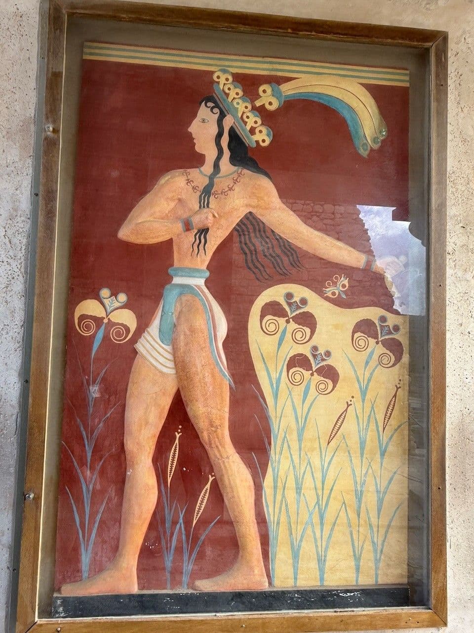 The Prince of the Lilies relief fresco at Knossos, a figure in a crown of lilies and feathers
